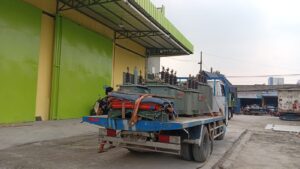 pengiriman trafo distribusi oleh muat cargo